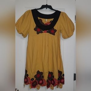 Dress made in China sz. S Gold in color beautiful details